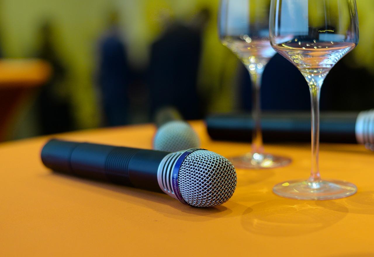 mic on a table with wine glasses