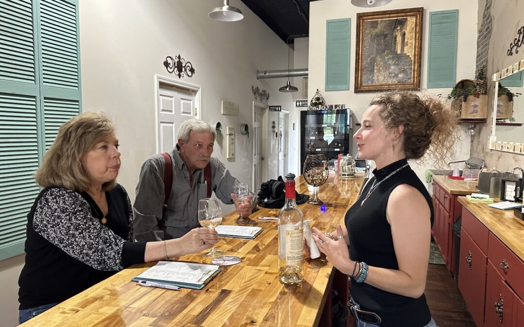 Photo of people at the tasting bar at Big Creek Winery West