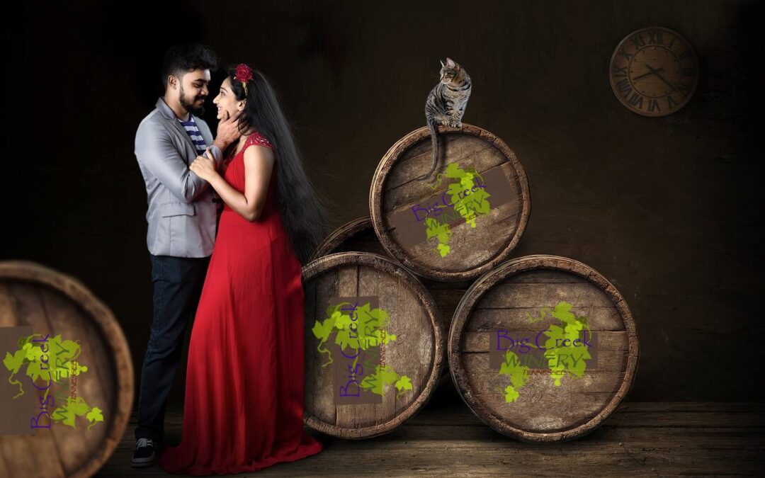 Photo of couple surrounded by wine barrels